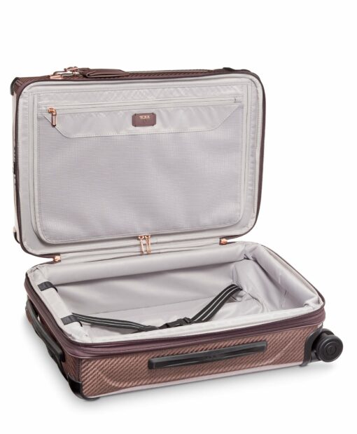 Shop TEGRA-LITE International Expandable 4 Wheeled Carry-On - Blush in australian