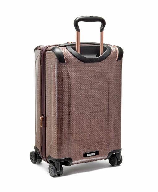 Shop TEGRA-LITE International Expandable 4 Wheeled Carry-On - Blush in australian