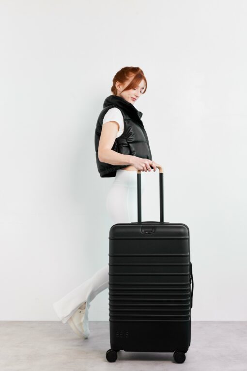 Shop The Medium Check-In Roller in Black in australian