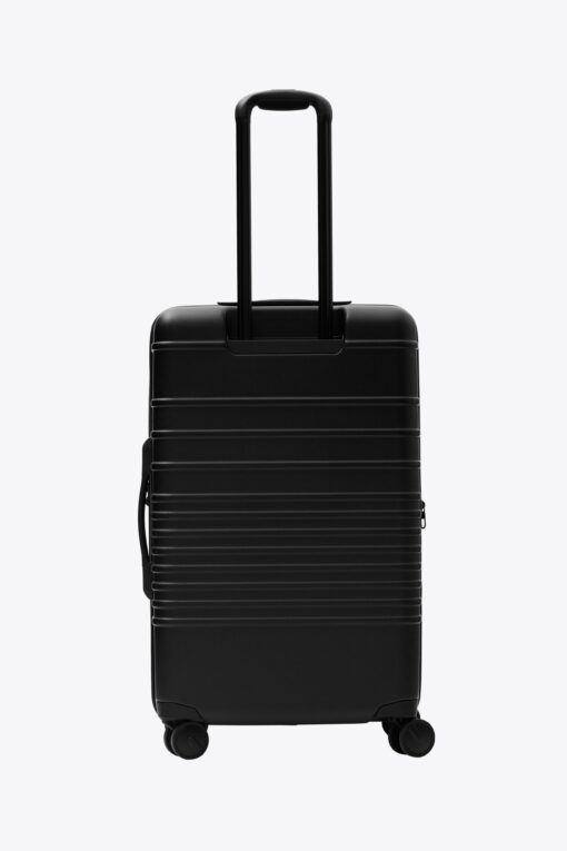 Shop The Medium Check-In Roller in All Black in australian