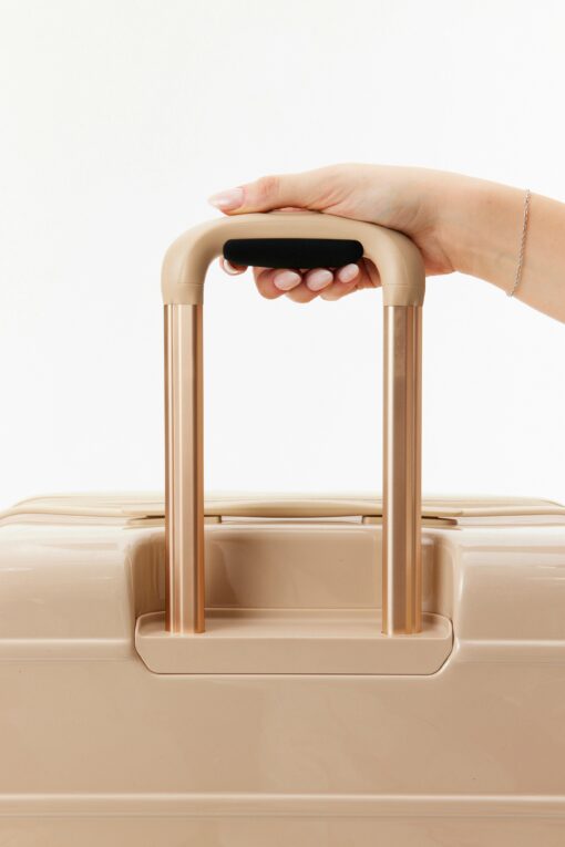 Shop The Carry-On Roller in Glossy Beige in australian