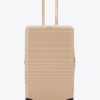 Shop The Medium Check-In Roller in Glossy Beige in australian