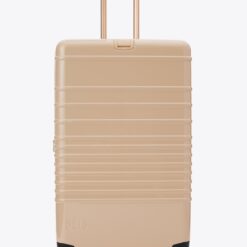 Shop The Large Check-In Roller in Glossy Beige in australian