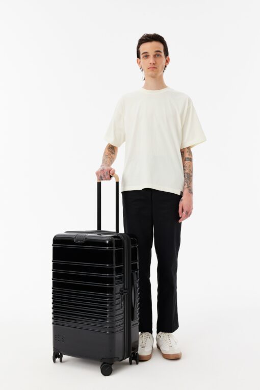 Shop The Medium Check-In Roller in Glossy Black in australian